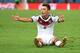 July 13, 2014; Rio de Janeiro, BRAZIL; Germany midfielder Mesut Ozil (8) reacts from the pitch against the Argentina in the championship match of the 2014 World Cup at Maracana Stadium. Mandatory Credit: Tim Groothuis/Witters Sport via USA TODAY Sports