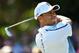 HOYLAKE, ENGLAND - JULY 17: Tiger Woods of the United States tees off on the 4th hole during the first round of The 143rd Open Championship at Royal Liverpool on July 17, 2014 in Hoylake, England. (Photo by Stuart Franklin/Getty Images)