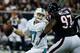 HOUSTON, TX - AUGUST 17: Ryan Tannehill #17 of the Miami Dolphins is pressured by Terrell McClain #97 of the Houston Texans during a preseaon game at Reliant Stadium on August 17, 2013 in Houston, Texas. (Photo by Scott Halleran/Getty Images)