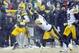 Dec 22, 2013; Green Bay, WI, USA; Green Bay Packers cornerback Micah Hyde (33) returns a kickoff for 70 yards before being tackled by Pittsburgh Steelers safety Shamarko Thomas (29) in the 4th quarter at Lambeau Field. Mandatory Credit: Benny Sieu-USA TO