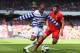 LIVERPOOL, ENGLAND - MAY 19: Loic Remy of Queens Park Rangers competes with Jose Enrique of Liverpool during the Barclays Premier League match between Liverpool and Queens Park Rangers at Anfield on May 19, 2013 in Liverpool, England. (Photo by Julian F
