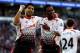CARDIFF, WALES - MARCH 22: Daniel Sturridge of Liverpool celebrates with team mate Luis Suarez after scoring his team's fifth goal during the Barclays Premier League match between Cardiff City and Liverpool at Cardiff City Stadium on March 22, 2014 in Ca