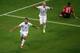 MANAUS, BRAZIL - JUNE 22: Clint Dempsey of the United States celebrates scoring his team's second goal with teammate Michael Bradley as Joao Pereira of Portugal looks on during the 2014 FIFA World Cup Brazil Group G match between the United States and Por