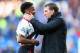 CARDIFF, WALES - MARCH 22: Brendan Rodgers (R) the manager of Liverpool chats with Raheem Sterling after his side's 6-3 victory during the Barclays Premier League match between Cardiff City and Liverpool at the Cardiff City Stadium on March 22, 2014 in C