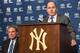 Cashman at Carlos Beltran's introductory press conference, with president Randy Levine to his right.