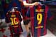 BARCELONA, SPAIN - JULY 12: An employee hangs a Luis Suarez shirt next to a Leo Messi shirt after printing his name and number on it at the FC Barcelona official store on July 12, 2014 in Barcelona, Spain. (Photo by David Ramos/Getty Images)