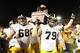 AMES, IA Ð SEPTEMBER 14: Offensive linesman Brandon Scherff #68 and his teammate defensive lineman Dominic Alvis #79 of the Iowa Hawkeyes celebrate their win over the Iowa State Cyclones 27-21 by carrying the Cy-Hawk Trophy to their fans at Jack Trice Sta