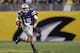 TEMPE, AZ - DECEMBER 28: Quarterback Jake Waters #15 of the Kansas State Wildcats scrambles with the football during the first quarter of the Buffalo Wild Wings Bowl against the Michigan Wolverines at Sun Devil Stadium on December 28, 2013 in Tempe, Ariz