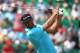 HOYLAKE, ENGLAND - JULY 18: Dustin Johnson of the United States hits his tee shot on the fourth hole during the second round of The 143rd Open Championship at Royal Liverpool on July 18, 2014 in Hoylake, England. (Photo by Matthew Lewis/Getty Images)