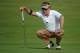 HOYLAKE, ENGLAND - JULY 17: Miguel Angel Jimenez of Spain lines up a putt during the first round of The 143rd Open Championship at Royal Liverpool on July 17, 2014 in Hoylake, England. (Photo by Andrew Redington/Getty Images)