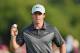 HOYLAKE, ENGLAND - JULY 18: Rory McIlroy of Northern Ireland celebrates a birdie putt on the 17th green during the second round of The 143rd Open Championship at Royal Liverpool on July 18, 2014 in Hoylake, England. (Photo by Stuart Franklin/Getty Image
