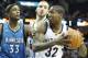 Mar 24, 2014; Memphis, TN, USA; Memphis Grizzlies forward Ed Davis (32) drives against Minnesota Timberwolves forward Dante Cunningham (33) as Grizzlies center Kosta Koufus (41) looks on during the first half at FedExForum. Mandatory Credit: Nelson Chenau