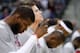 Mar 11, 2014; Auburn Hills, MI, USA; Detroit Pistons power forward Greg Monroe (10) points up during the national anthem before the game against the Sacramento Kings at The Palace of Auburn Hills. Pistons beat the Kings 99-89. Mandatory Credit: Raj Mehta-