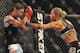 SAN JOSE, CA - AUGUST 15: Cris Cyborg (R) battles Gina Carano during their Middleweight Championship fight at Stikeforce: Carano vs. Cyborg on August 15, 2009 in San Jose, California. (Photo by Jon Kopaloff/Getty Images)