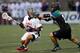 BOSTON, MA - JUNE 26: Rob Pannell #32 of Team USA battles Kyle Sweeney #77 of Team MLL in the first quarter during the 2014 MLL All Star Game at Harvard Stadium on June 26, 2014 in Boston, Massachusetts. (Photo by Jim Rogash/Getty Images)