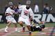 BOSTON, MA - JUNE 26: Rob Pannell #32 of Team USA gets by Jordan Burke #5 of Team MLL in the first quarter during the 2014 MLL All Star Game at Harvard Stadium on June 26, 2014 in Boston, Massachusetts. (Photo by Jim Rogash/Getty Images)
