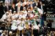 SAN ANTONIO, TX - JUNE 15: Members of the San Antonio Spurs pose for a picture after the win against the Miami Heat during Game Five of the 2014 NBA Finals between the Miami Heat and San Antonio Spurs at AT&T Center on June 15, 2014 in San Antonio, Texas