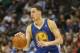 January 13, 2013; Denver, CO, USA; Golden State Warriors guard Klay Thompson (11) takes the ball up the court during the second half against the Denver Nuggets at the Pepsi Center. The Nuggets won 116-105. Mandatory Credit: Chris Humphreys-USA TODAY Spo