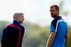 ST ALBANS, ENGLAND - MAY 14: Arsene Wenger of Arsenal talks to Per Mertesacker of Arsenal during a training session ahead of the FA Cup Final match between Arsenal and Hull City at London Colney on May 14, 2014 in St Albans, England. (Photo by Clive Mas