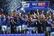 LEICESTER, ENGLAND - MAY 03: Wes Morgan of Leicester City lifts the Championship trophy after the Sky Bet Championship match between Leicester City and Doncaster Rovers at The King Power Stadium on May 3, 2014 in Leicester, England. (Photo by Michael Reg
