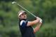 HOYLAKE, ENGLAND - JULY 19: Victor Dubuisson of France hits an approach during the third round of The 143rd Open Championship at Royal Liverpool on July 19, 2014 in Hoylake, England. (Photo by Stuart Franklin/Getty Images)