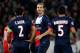 PARIS, FRANCE - MARCH 12: Zlatan Ibrahimovic (C) of PSG speaks to team mates Thiago Silva and Marquinhos during the UEFA Champions League Round of 16 second leg match between Paris Saint-Germain FC and Bayer Leverkusen at Parc des Princes on March 12, 20