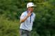HOYLAKE, ENGLAND - JULY 19: Rickie Fowler of the United States makes birdie on the tenth hole during the third round of The 143rd Open Championship at Royal Liverpool on July 19, 2014 in Hoylake, England. (Photo by Andrew Redington/Getty Images)