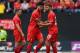 PRESTON, LANCASHIRE - JULY 19: Fabio Borini of Liverpool speaks to team mate Emre Can as he is substituted with an injury during the pre season friendly match between Preston North End and Liverpool at Deepdale on July 19, 2014 in Preston, Lancashire. (P