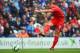 PRESTON, LANCASHIRE - JULY 19: Rickie Lambert of Liverpool shoots at goal during the pre season friendly match between Preston North End and Liverpool at Deepdale on July 19, 2014 in Preston, Lancashire. (Photo by Michael Regan/Getty Images)