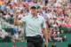 HOYLAKE, ENGLAND - JULY 19: Rory McIlroy of Northern Ireland waves to the gallery on the 18th green after a four-under par 68 during the third round of The 143rd Open Championship at Royal Liverpool on July 19, 2014 in Hoylake, England. (Photo by Andrew