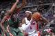 AUBURN HILLS, MI - MARCH 31: Josh Smith #6 of the Detroit Pistons drives against the Milwaukee Bucks on March 31, 2014 at The Palace of Auburn Hills in Auburn Hills, Michigan. NOTE TO USER: User expressly acknowledges and agrees that, by downloading and/o