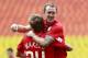MOSCOW, RUSSIA - JULY 29: Aiden McGeady (R) and Evgeni Makeev of FC Spartak Moscow celebrate after scoring a goal during the Russian Premier League match between FC Spartak Moscow and FC Volga Nizhny Novgorod at the Luzhniki Stadium on July 29, 2012 in Mo