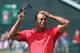 HOYLAKE, ENGLAND - JULY 20: Tiger Woods of the United States reacts on the 18th green during the final round of The 143rd Open Championship at Royal Liverpool on July 20, 2014 in Hoylake, England. (Photo by Andrew Redington/Getty Images)