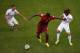 MANAUS, BRAZIL - JUNE 22: William Carvalho of Portugal takes on Graham Zusi and Kyle Beckerman of the United States during the 2014 FIFA World Cup Brazil Group G match between the United States and Portugal at Arena Amazonia on June 22, 2014 in Manaus, B