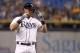 Jul 11, 2014; St. Petersburg, FL, USA; Tampa Bay Rays second baseman Ben Zobrist (18) reacts a while looking at dugout after hitting a single in the first inning against the Toronto Blue Jays at Tropicana Field. Mandatory Credit: Kim Klement-USA TODAY Spo
