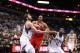 MINNEAPOLIS, MN - FEBRUARY 10: Kevin Love #42 of the Minnesota Timberwolves boxes out during the game against Dwight Howard #12 of the Houston Rockets on February 10, 2014 at Target Center in Minneapolis, Minnesota. NOTE TO USER: User expressly acknowledg