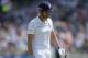 LONDON, ENGLAND - JULY 18: England captain Alastair Cook leaves the field after being dismissed by Bhuvneshwar Kumar of India during day two of 2nd Investec Test match between England and India at Lord's Cricket Ground on July 18, 2014 in London, United