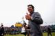 HOYLAKE, ENGLAND - JULY 20: Rory McIlroy of Northern Ireland gives a thumbs up to the crowd after his two-stroke victory at The 143rd Open Championship at Royal Liverpool on July 20, 2014 in Hoylake, England. (Photo by Tom Pennington/Getty Images)