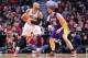 Jan 21, 2013; Chicago, IL, USA; Chicago Bulls power forward Carlos Boozer (5) is defended by Los Angeles Lakers power forward Pau Gasol (16) during the second half at the United Center. The Bulls beat the Lakers 95-83. Mandatory Credit: Rob Grabowski-USA