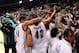 Dec 1, 2013; Birmingham, AL, USA; UAB Blazers Thaddeus Rideau (11) and Rod Rucker (42) are greeted by fans after their 63-59 win over the North Carolina Tar Heels at Bartow Arena. Mandatory Credit: Kelly Lambert-USA TODAY Sports