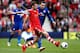 SOUTHAMPTON, ENGLAND - APRIL 12: Morgan Schneiderlin of Southampton passes under pressure from Jordan Mutch of Cardiff during the Barclays Premier League match between Southampton and Cardiff City at St Mary's Stadium on April 12, 2014 in Southampton, Eng