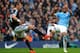 MANCHESTER, ENGLAND - APRIL 05: Morgan Schneiderlin of Southampton and Fernandinho of Manchester City compete for the ball during the Barclays Premier League match between Manchester City and Southampton at Etihad Stadium on April 5, 2014 in Manchester,