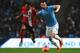 MANCHESTER, ENGLAND - JANUARY 15: Alvaro Negredo of Manchester City is challenged by Lee Williamson of Blackburn Rovers during the Budweiser FA Cup Third Round Replay match between Manchester City and Blackburn Rovers at the Etihad Stadium on January 15,