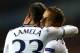 LONDON, ENGLAND - DECEMBER 12: Roberto Soldado of Tottenham Hotspur hugs Erik Lamela of Tottenham Hotspur after scoring the first goal during the UEFA Europa League Group K match between Tottenham Hotspur FC and FC Anji Makhachkala at White Hart Lane on