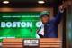 Jun 26, 2014; Brooklyn, NY, USA; Marcus Smart (Oklahoma State) waves to the crowd as he leaves the stage after being selected as the number six overall pick to the Boston Celtics in the 2014 NBA Draft at the Barclays Center. Mandatory Credit: Brad Penner-