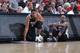 LAS VEGAS, NV - JULY 16: Jabari Parker #12 and Gilbert Brown #5 of the Milwaukee Bucks wait to check into the game against the San Antonio Spurs at the Samsung NBA Summer League 2014 on July 16, 2014 at the Thomas & Mack Center in Las Vegas, Nevada. NOTE