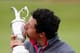 HOYLAKE, ENGLAND - JULY 20: Rory McIlroy of Northern Ireland kisses the Claret Jug after his two-stroke victory at The 143rd Open Championship at Royal Liverpool on July 20, 2014 in Hoylake, England. (Photo by Tom Pennington/Getty Images)