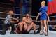 Rusev attacks an unconscious Jack Swagger.