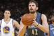 OAKLAND, CA - APRIL 14: Kevin Love #42 of the Minnesota Timberwolves shoots a free throw against the Golden State Warriors on April 14, 2014 at Oracle Arena in Oakland, California. NOTE TO USER: User expressly acknowledges and agrees that, by downloading