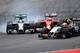 Lewis Hamilton passes Kimi Raikkonen during the race.